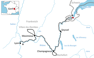 Map showing cycling route through France and Switzerland from Geneva to Lyon via Seyssel, Champagneux, and Meximieux along the Rhône river.