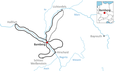 Karte mit Radwegen von Bamberg nach Haßfurt, Lichtenfels und Schloss Weißenstein. Die Flüsse Main, Regnitz und Aisch sind markiert.